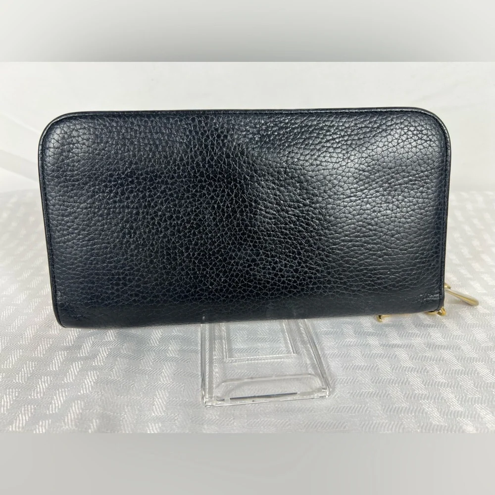 1009: Christian Dior Pebbled Leather Zip Continental Wallet, Fuchsia Int